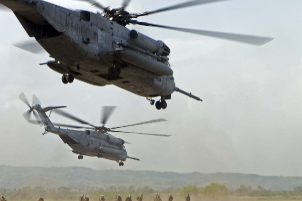 US Marines and sailors conduct a raid at Basa Air Base, Pampanga province north of Manila in this file photo. The raid was executed with the assistance of the Philippine Air Force as part of annual bilateral training exercises. Photo: Associated Press