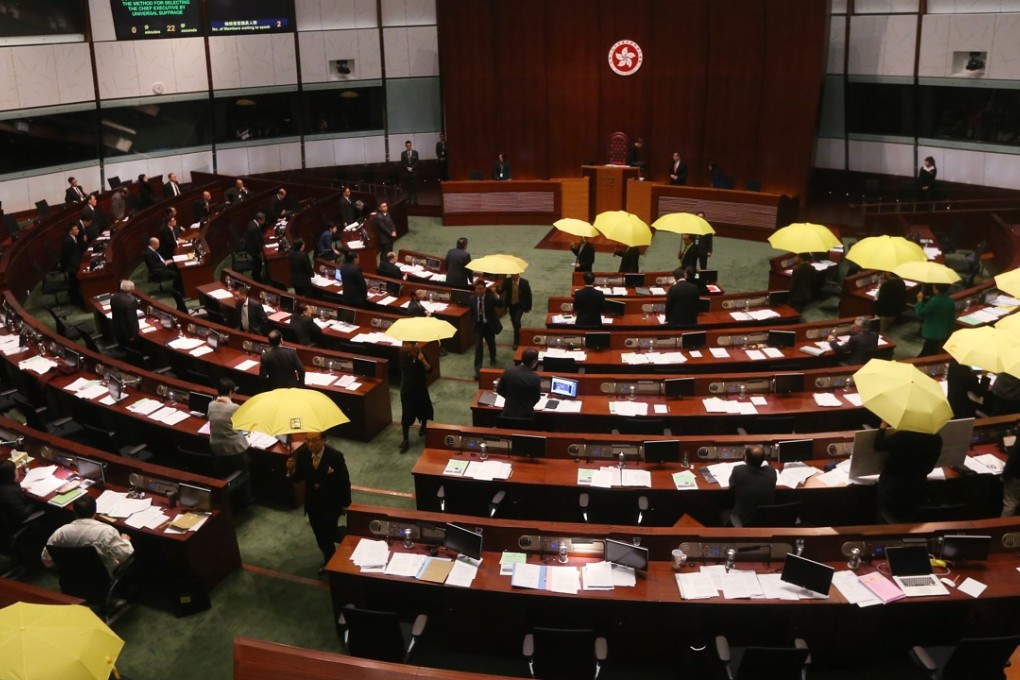 Another protest in the Legislative Council chamber. Photo: David Wong