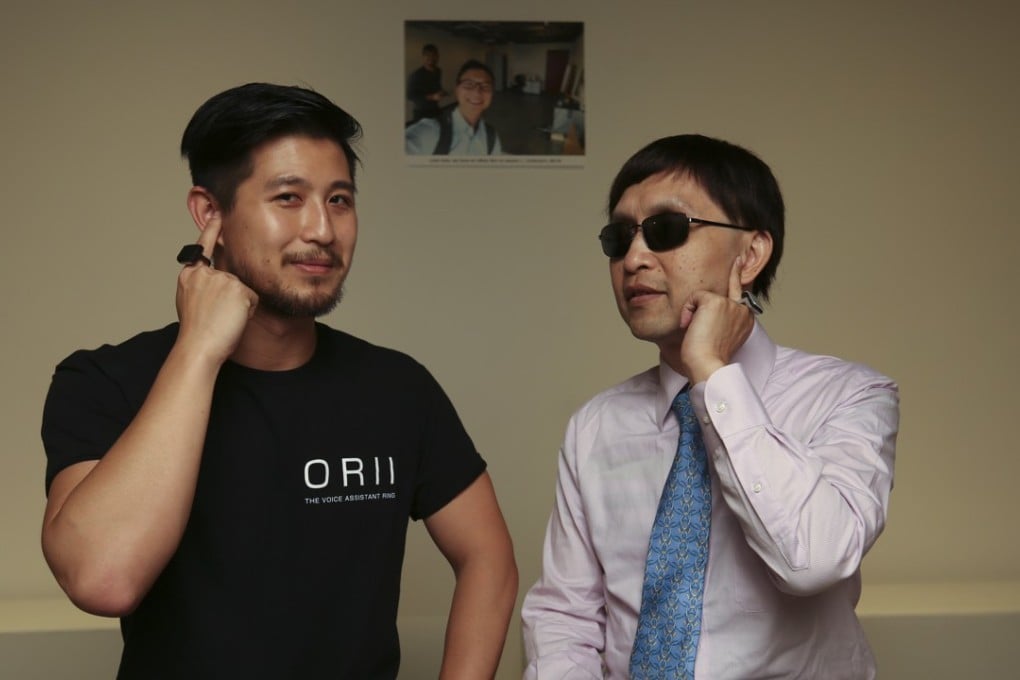 Origami Labs co-founder and CEO Kevin Wong (left) says the Orii ring was inspired by the challenges faced by his father Peter (right), a visually impaired programmer. Photo: Xiaomei Chen