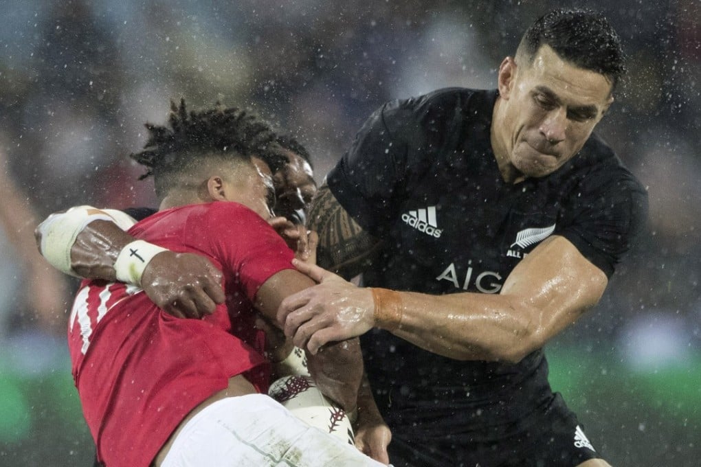 New Zealand’s Sonny Bill Williams (right) tackles British & Irish Lions winger Anthony Watson during the second test in Wellington. Photo: AP