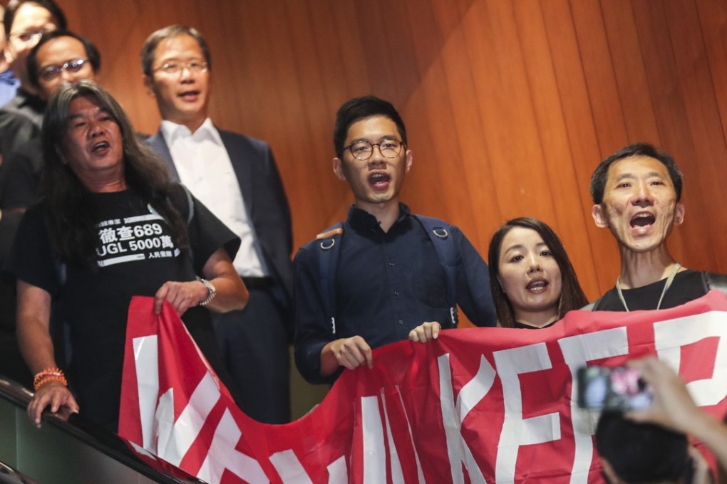 Lawmakers (from left, front) Leung Kwok-hung, Nathan Law, Lau Siu-lai and Edward Yiu bid farewell to the Legislative Council. Photo: Edward Wong