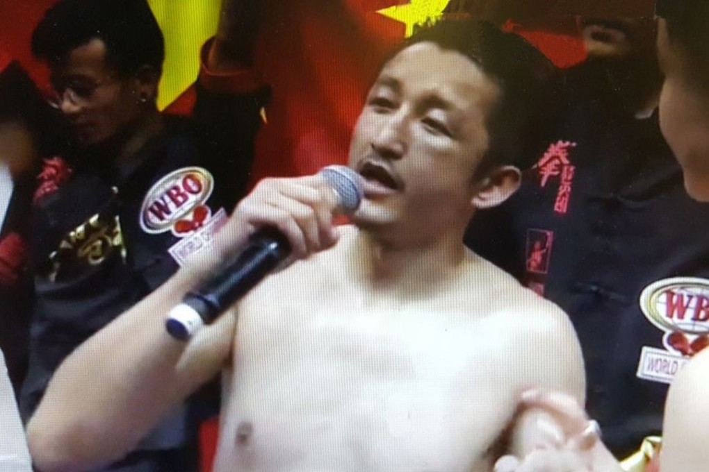 China's Zou Shiming speaks to the audience after losing his WBO world title fight in Shanghai. Photo: Handout
