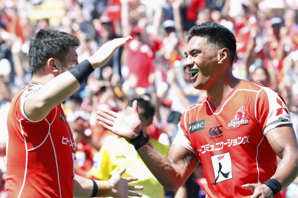 Sunwolves’ Timothy Lafaele (right) celebrates a try with a teammate during his side’s Super Rugby win over the Blues. Photo: Kyodo