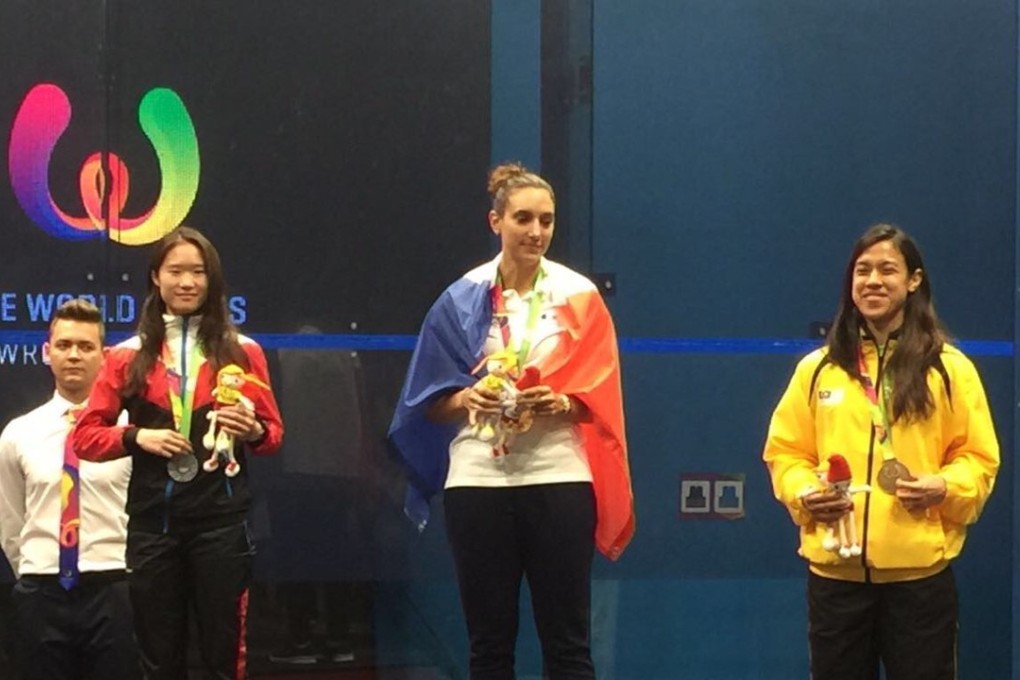 Joey Chan (left) on the podium with Camille Serme and Nicol David. Photo: Handout