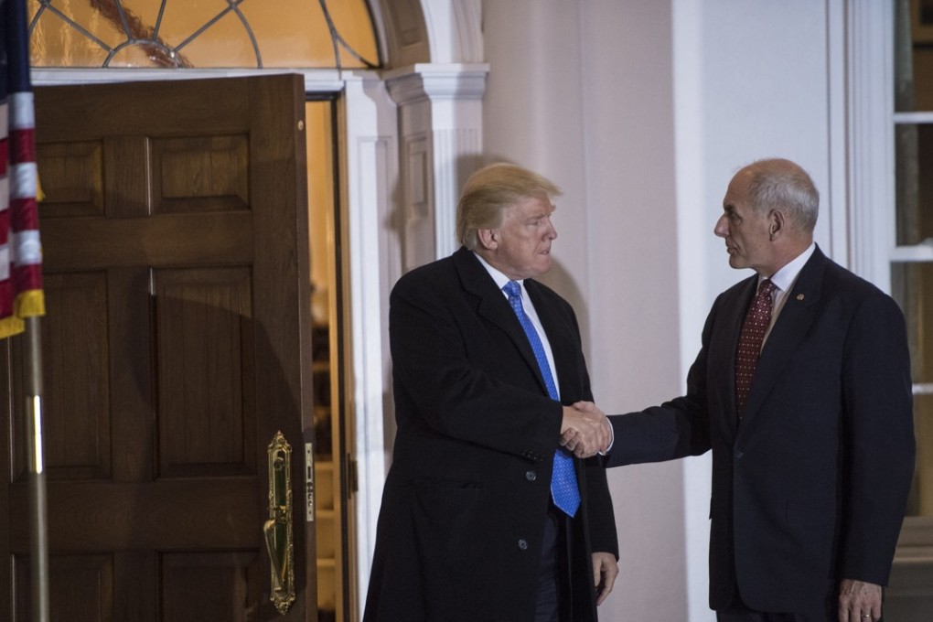 US President Donald Trump walks out with John Kelly at Trump National Golf Club in Bedminster Township, New Jersey, in November after the election. Kelly was named Trump's chief of staff on Friday. File photo: The Washington Post