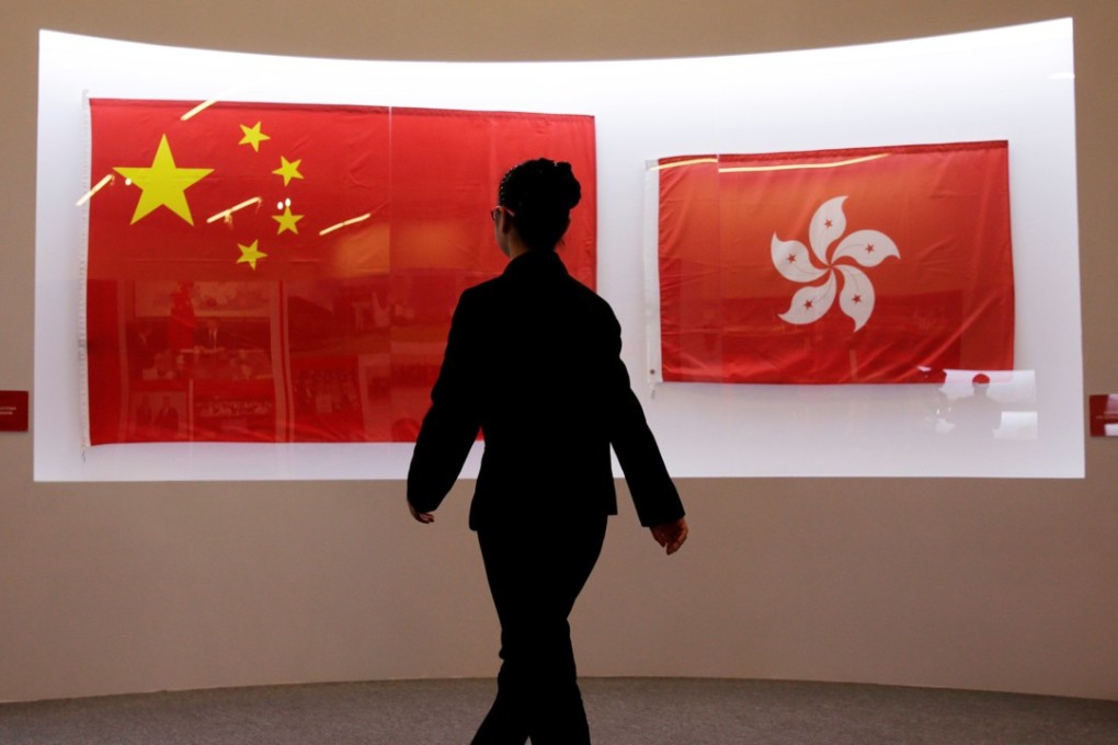 The flags of China and Hong Kong used during the 1997 Hong Kong handover ceremony are displayed at the National Museum of China in Beijing. Photo: REUTERS/Jason Lee