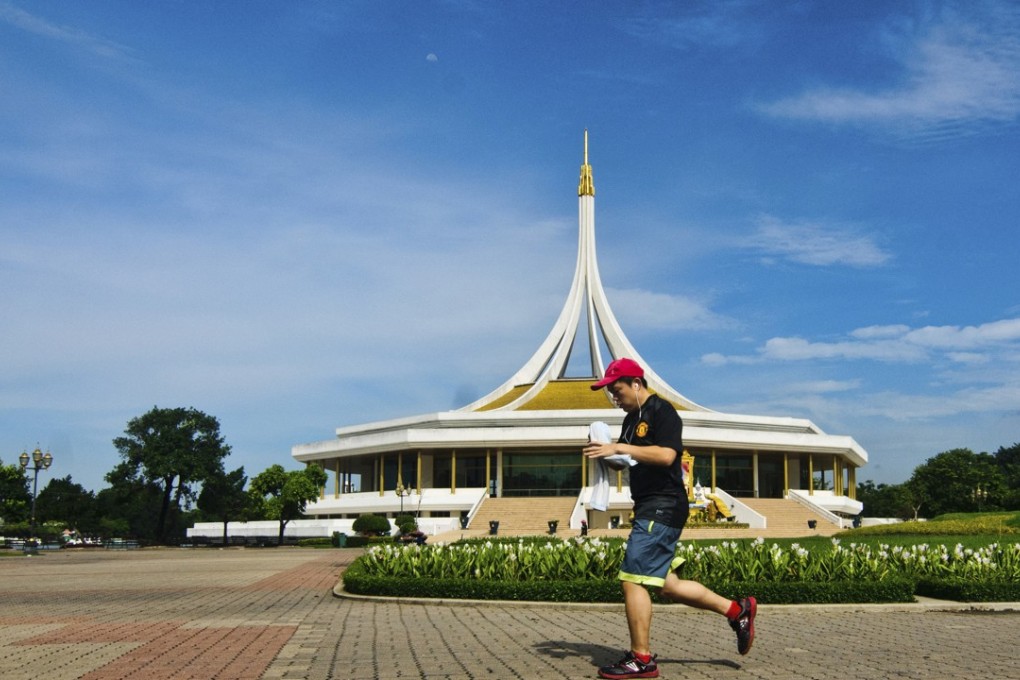 A jogger at at Suan Luang King's Park, Rama IX, Bangkok. “Without the distractions of statistics and self-enforced play lists, I realised Rama IX Park was a really beautiful park,” writes Andrew Biggs