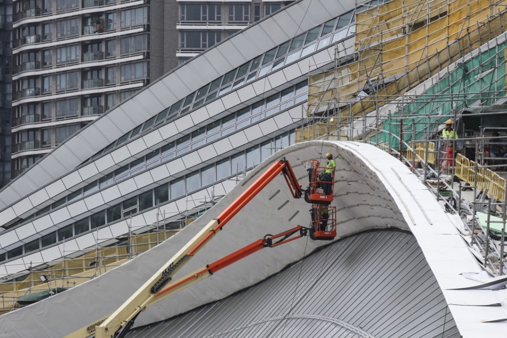 Work nears completion on the West Kowloon terminus, where the plan is to lease a quarter of it to mainland authorities. Photo: Felix Wong