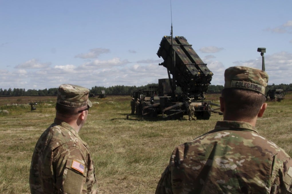 US soldiers stand behind a US surface-to-air anti-missile “Patriot” launcher at the Sauliai air base in Lithuania last week. A possible deployment in fellow Baltic state Estonia is also under discussion with the US, according to Estonia’s prime minister. Photo: EPA