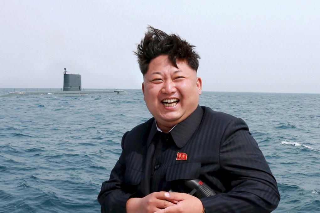 North Korean leader Kim Jong-un watches the test-fire of a strategic submarine underwater ballistic missile in 2015. Photo: Reuters