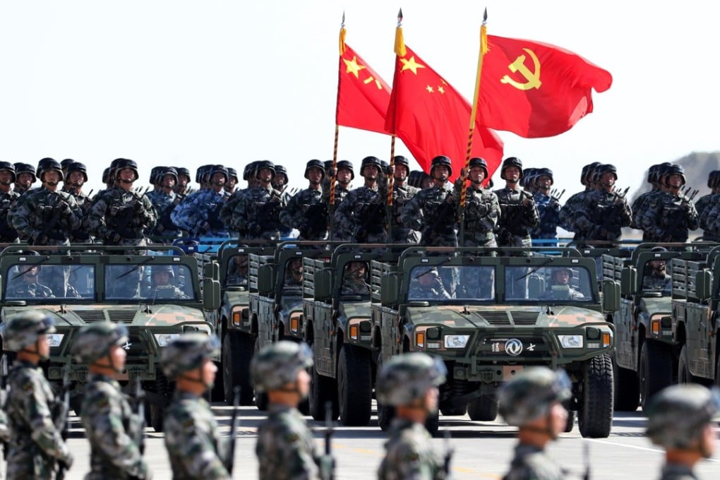 The flags of the People’s Liberation Army, China and the Communist Party are flown at Sunday’s military parade at the Zhurihe training base in Inner Mongolia. Photo: Xinhua