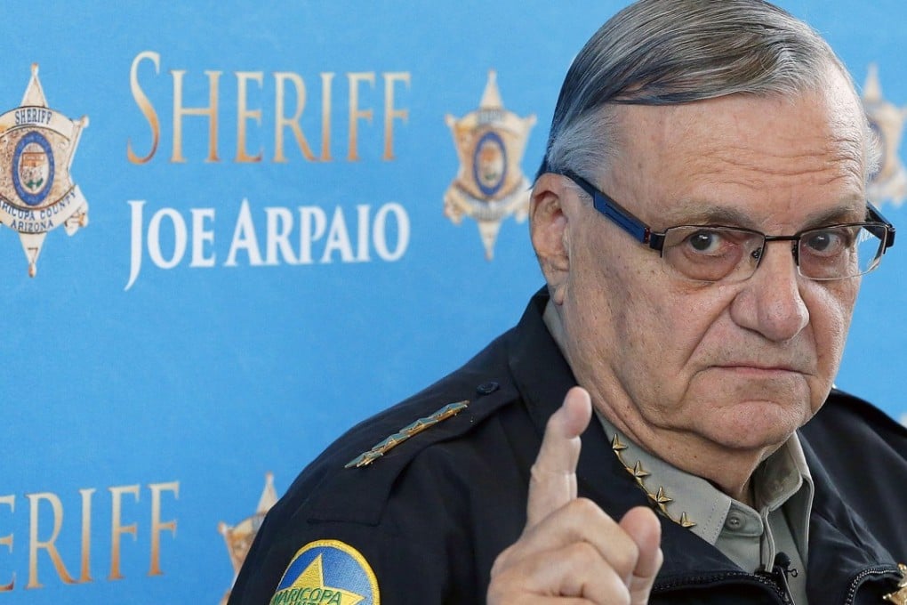 Former Maricopa County Sheriff Joe Arpaio pauses as he answers a question at a news conference at Maricopa County Sheriff's Office Headquarters in Phoenix several months ago. Arpaio was convicted of a criminal charge Monday, July 31, 2017, for refusing to stop traffic patrols that targeted immigrants. Photo: AP