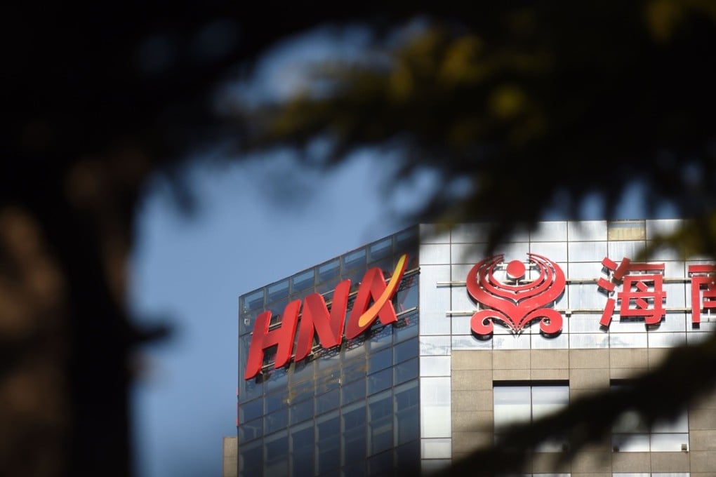 The HNA logo is seen on a building in Beijing. The Chinese conglomerate has been on a foreign-asset-buying binge. Photo: AFP