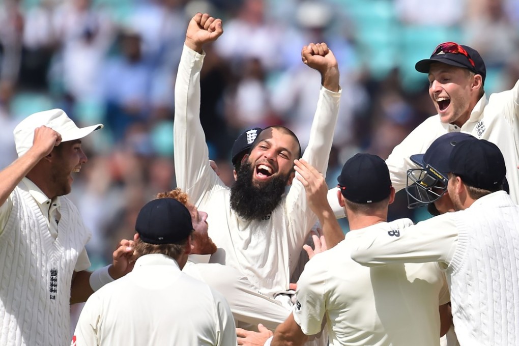 England’s Moeen Ali is at the centre of celebrations as his hat-trick sealed a third test win against South Africa. Photo: AFP