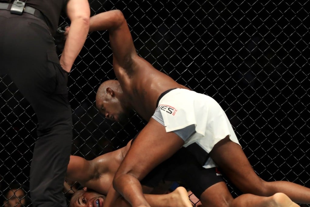 Jon Jones knocks out Daniel Cormier at UFC 214. Photo: AFP