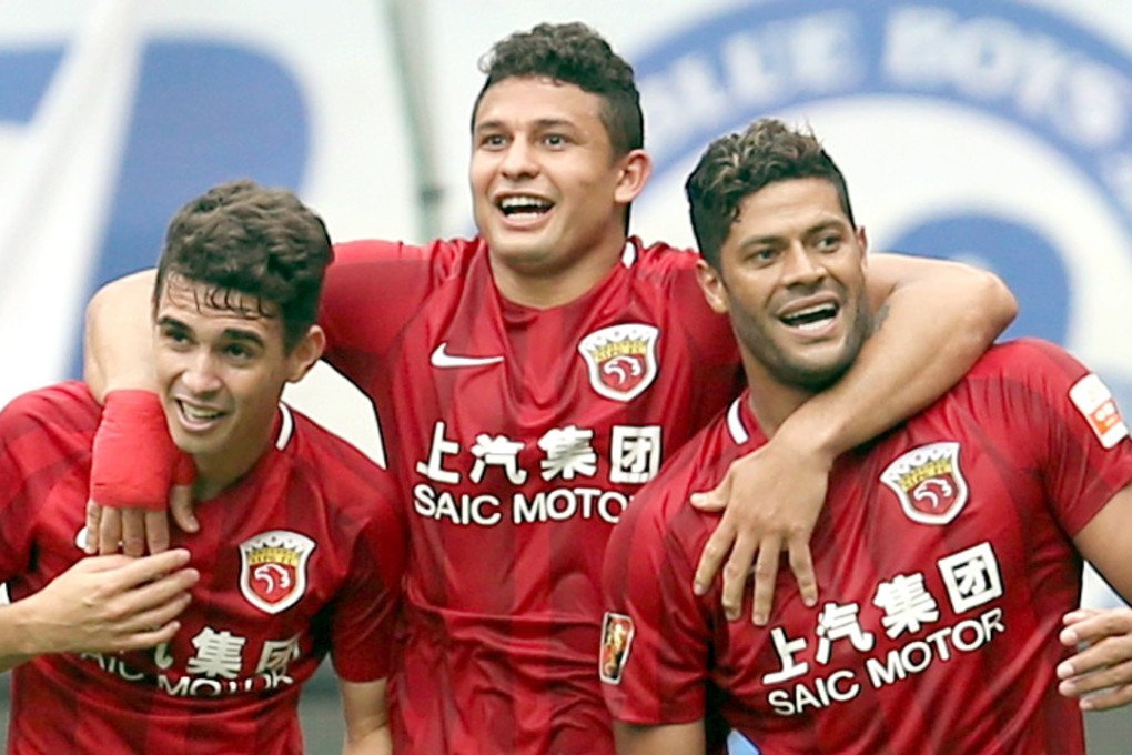 Shanghai SIPG splashed the cash in Brazilian trio Oscar (left), Elkeson and Hulk. Photo: Xinhua队。 新华社记者凡军摄