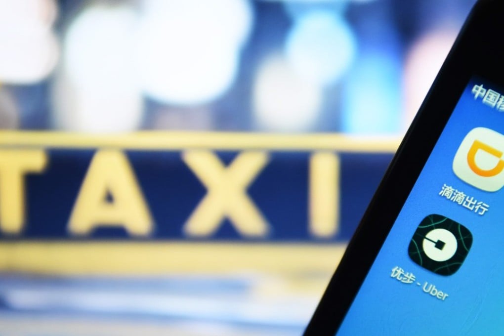 Apps for Didi and Uber on the cellphone of a user in Hangzhou, the capital of east China's Zhejiang Province. Photo: Xinhua