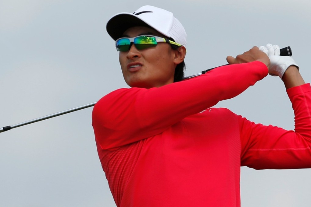 China’s Li Haotong hits his tee shot during the third round of the British Open. Photo: Reuters