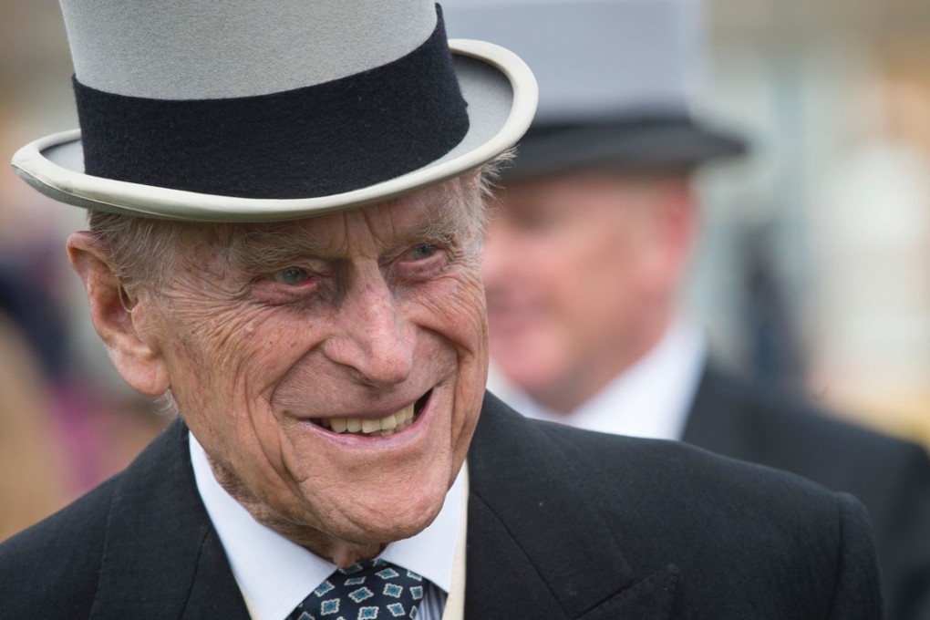 This file photo taken on May 16, 2017, shows Britain's Prince Philip, the Duke of Edinburgh as he greets guests at a garden party at Buckingham Palace in London. Photo: AFP