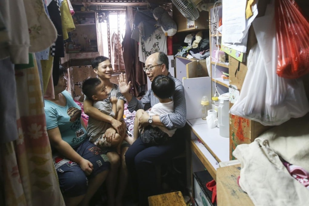 Housing minister Frank Chan floated the idea of renovated subdivided homes during a visit to flats in Sham Shui Po. Photo: David Wong