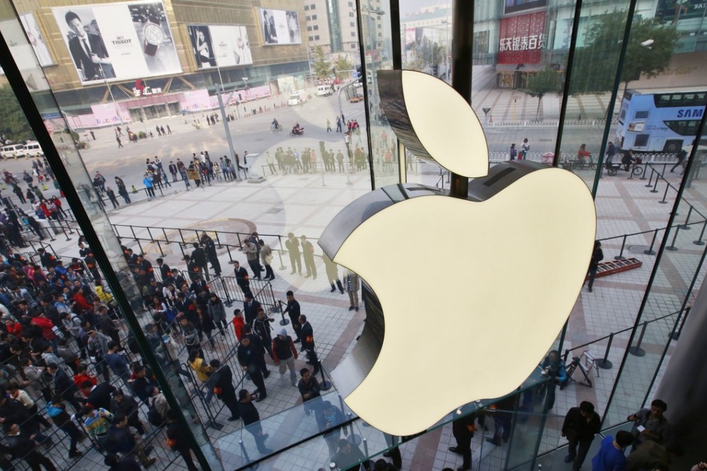 Chinese fans line up outside the Apple store in Wangfujing, Beijing. Apple sells more iPhones in China than anywhere else. Photo: EPA