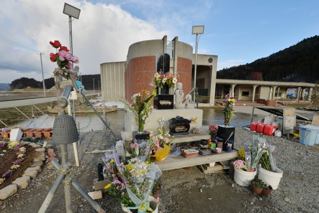 A cenotaph for victims of the 2011 Japan tsunami stands in front of the former Okawa Elementary School in Ishinomaki, Miyagi prefecture, where 74 children and 10 teachers died. Photo: AFP