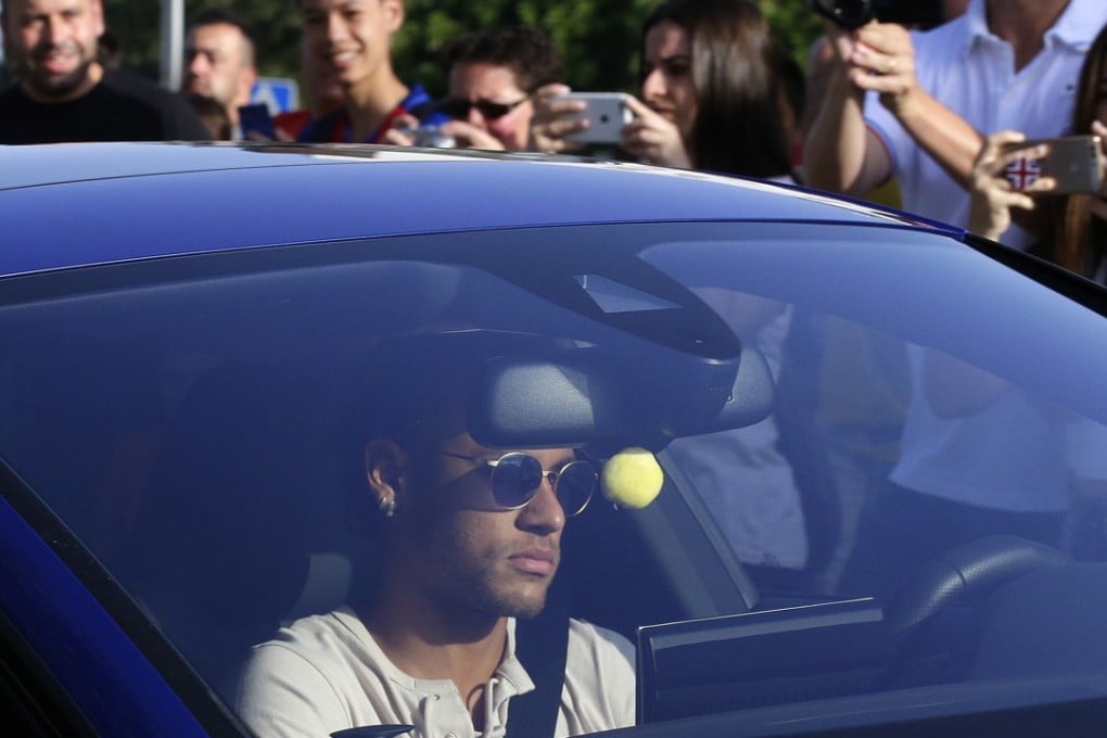 Neymar arrives for training. Photo: AP