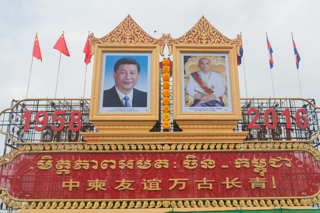 Portraits of Chinese President Xi Jinping and Cambodian King Norodom Sihamoni in Phnom Penh, during Xi’s visit in 2016. Picture: Alamy