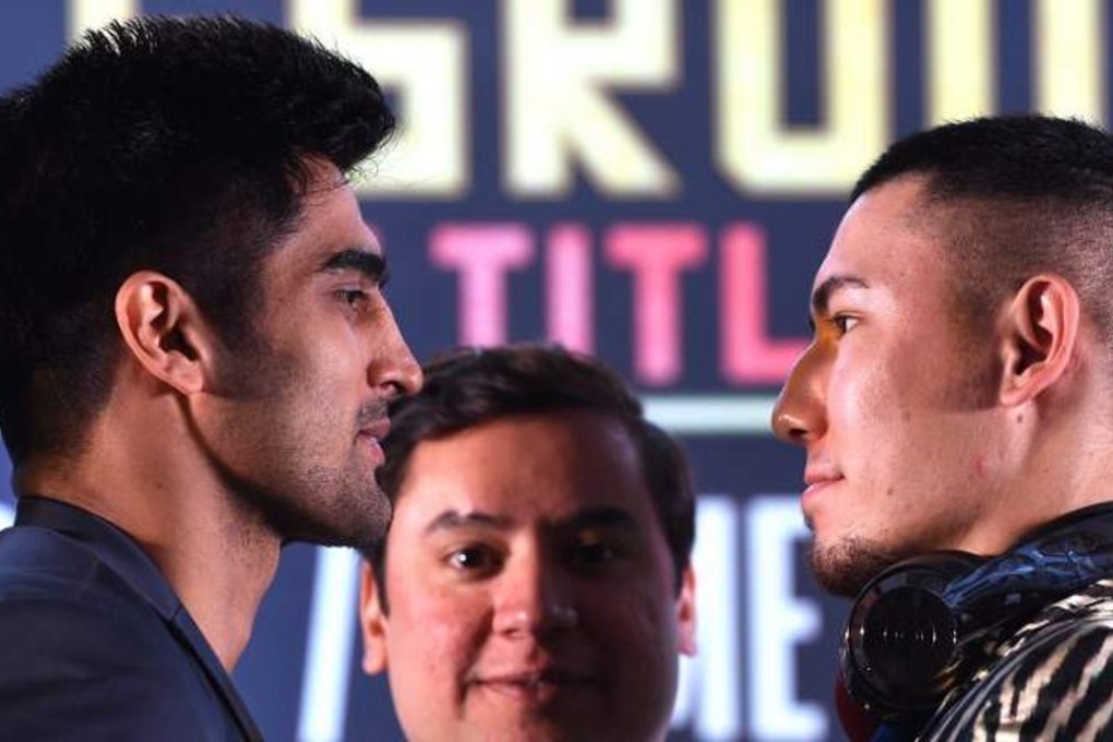 India’s Vijender Singh faces off against China’s Zulipikar Maimaitiali in ‘Battleground Asia’ on Saturday night in Mumbai. Photos: AFP