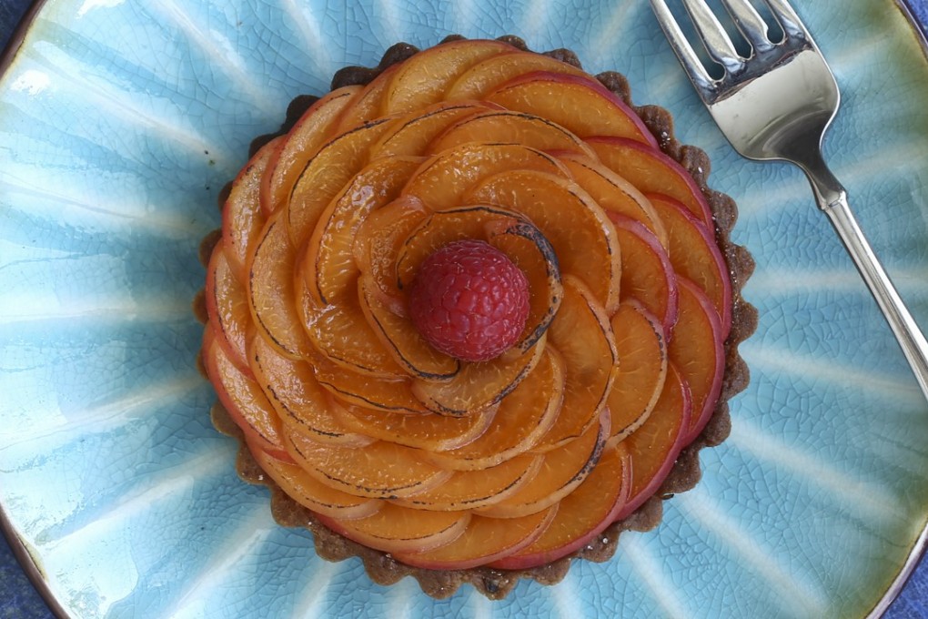Apricot and raspberry tarts with almond filling. Photography: Jonathan Wong. Styling: Nellie Ming Lee