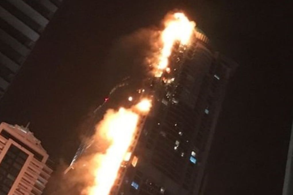 Fire engulfs parts of the Torch skyscraper in Dubai on Friday. Photo: Nivetha Vijayasathan / WhatsApp