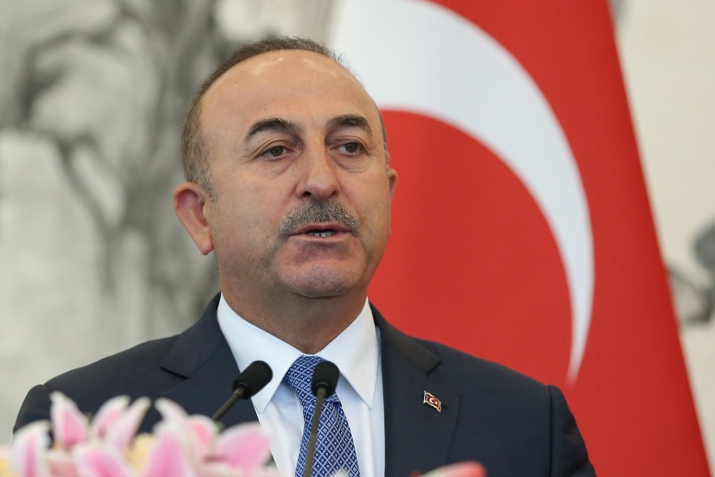 Turkish Foreign Minister Mevlut Cavusoglu speaking during a press conference in Beijing on Thursday. Photo: EPA