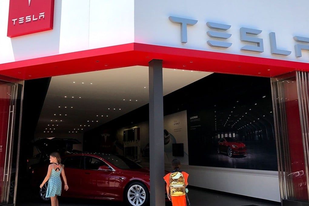 By merely posting less-than-expected losses, Tesla increased its share price by more than 6 per cent in after-market trading. Photo: AFP