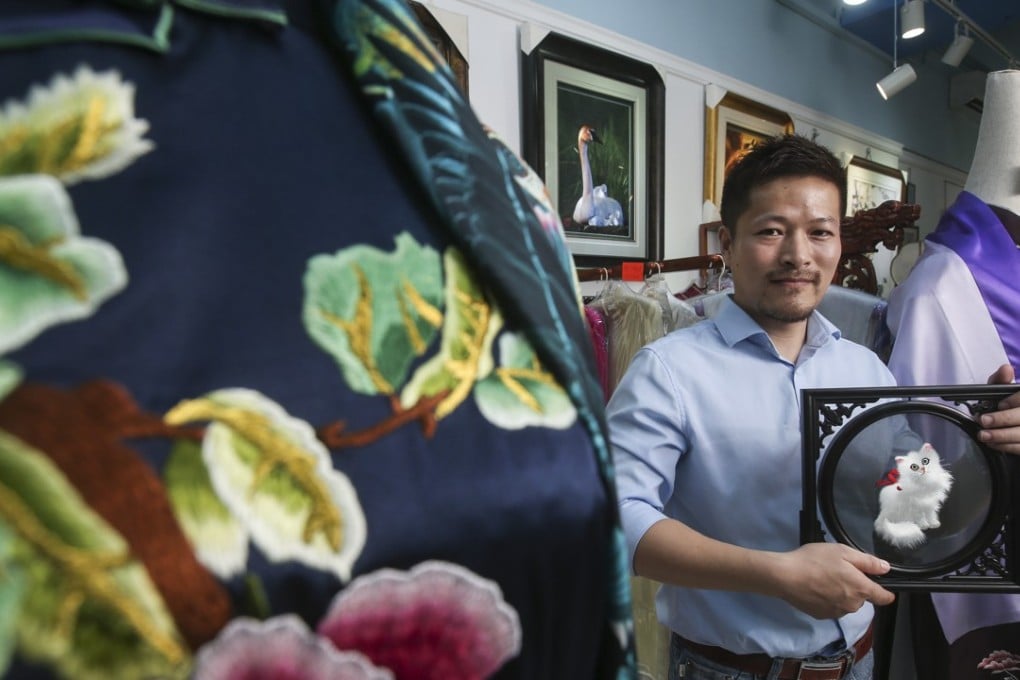 Andy Gu Yu-lai helps his family run a traditional Chinese embroidery business based in Wan Chai. Photo: K. Y. Cheng