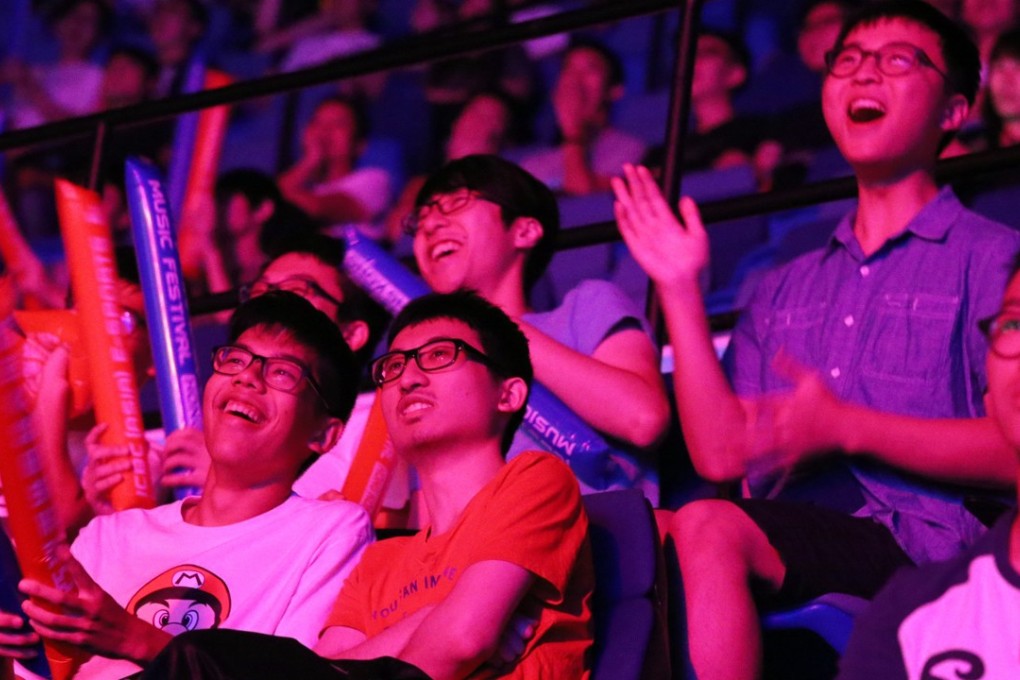 Spectators watch an opening video gaming match at Hong Kong’s first mega e-sports festival. Photo: Dickson Lee