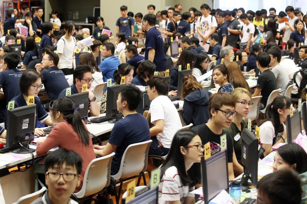 Diploma of Secondary Education Examination students apply for self-financed degrees, associate degrees and higher diplomas at the Institute of Vocational Education campus in Cheung Sha Wan, on July 12. Photo: K. Y. Cheng