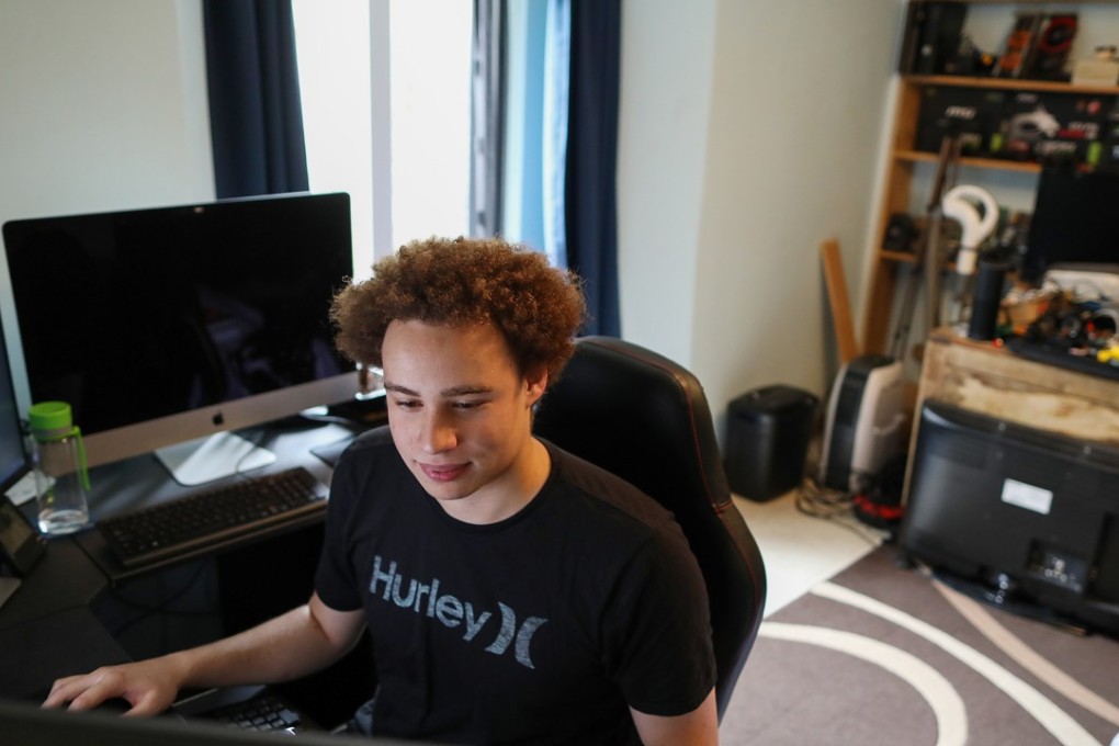 Marcus Hutchins, digital security researcher for Kryptos Logic, works on a computer in his bedroom in Ilfracombe, UK. Credited with stopping a global cyberattack, he was arrested in Las Vegas for creating malware that would grab the passwords of bank accounts. Photo: Bloomberg