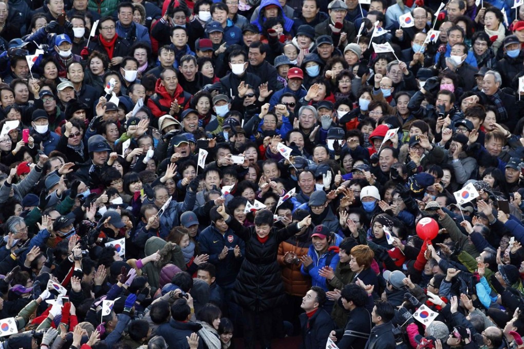 Disgraced former president Park Geun-hye surrounded of supporters while campaigning for presidency in 2012. Photo: Reuters