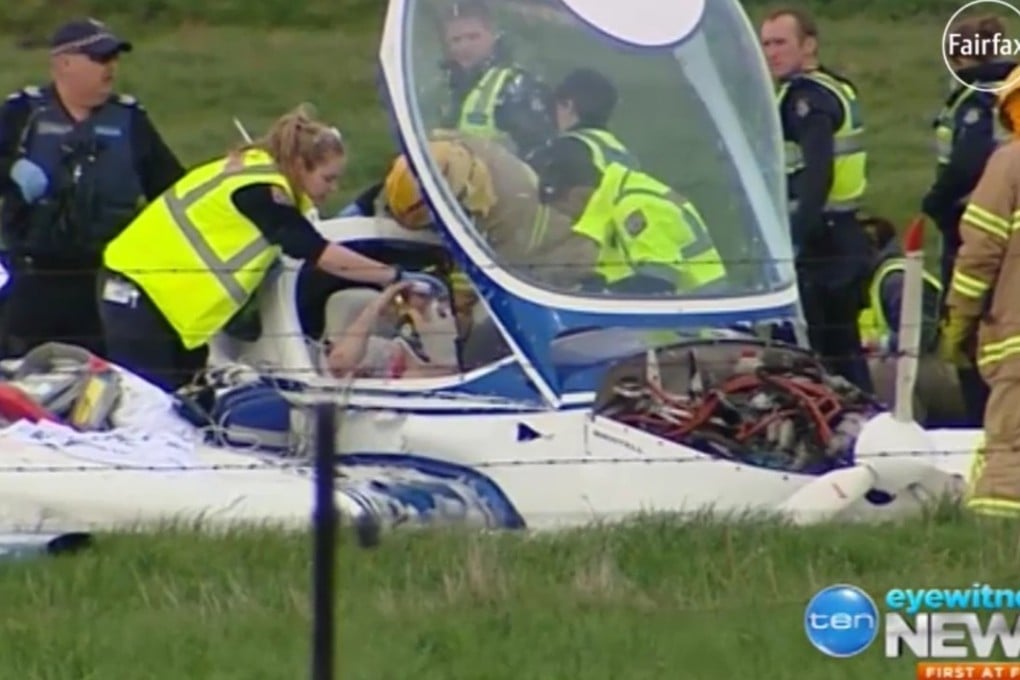 Screen images of news footage of the plane crash in the Melbourne suburbs of Clyde North.