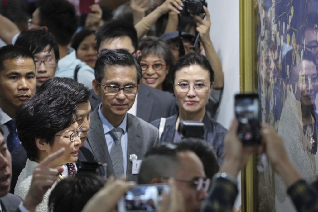 Chief Executive Carrie Lam attends an ink exhibition. She defended the system of checks and balances in the city. Photo: Felix Wong