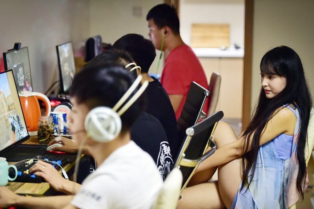 Li Wei, aka e-sports gamer and entrepreneur ViVi keeps an eye on one of her all-male teams. Photo: Handout