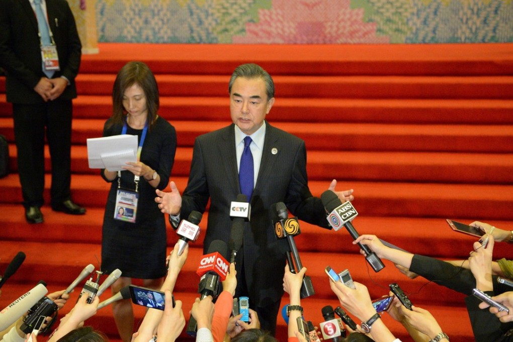 China's Foreign Minister Wang Yi speaks during a press conference on the sidelines of the 50th Association of Southeast Asian Nations (Asean) regional security forum in Manila on Sunday. Photo: AFP