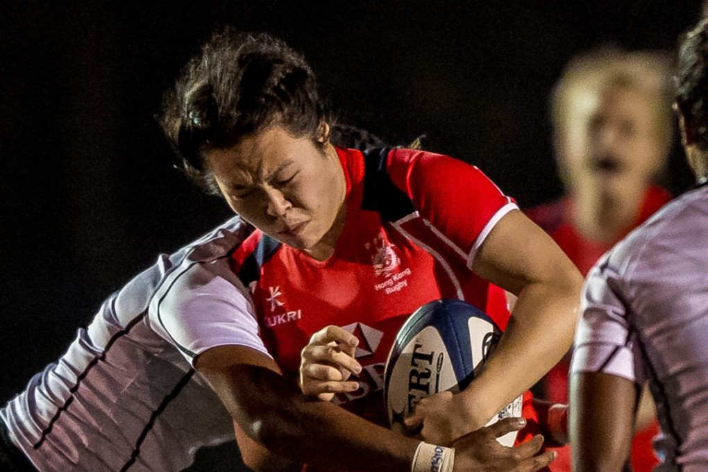 Karen So surges forward for Hong Kong against Fiji in the Women’s Rugby World Cup qualifiers. Photos: HKRU