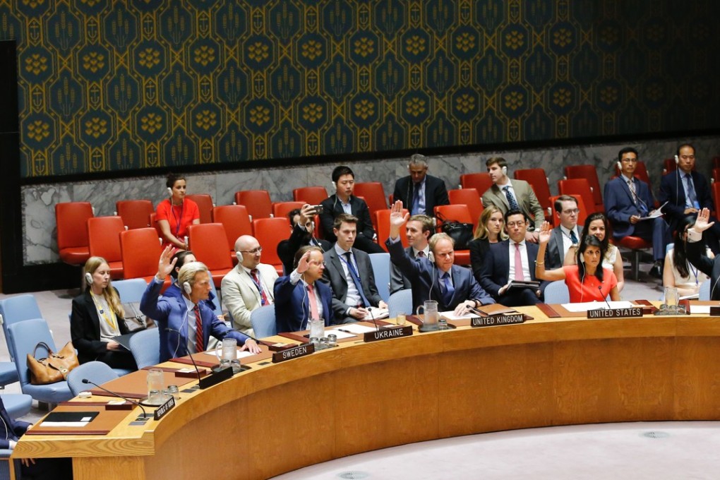 UN Security Council members vote on a US-drafted resolution toughening sanctions on North Korea, at the United Nations Headquarters in New York, on Saturday. Photo: AFP
