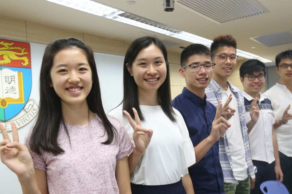 High DSE scorers Angela Sze Yik-yan (left), Esther Tang Wai-chi, Kony Kwong Hing-tim, Leung Kwun-hong, Law Tsz-fung and Richard Choy Wai-chak at HKU on Monday. Photo: David Wong