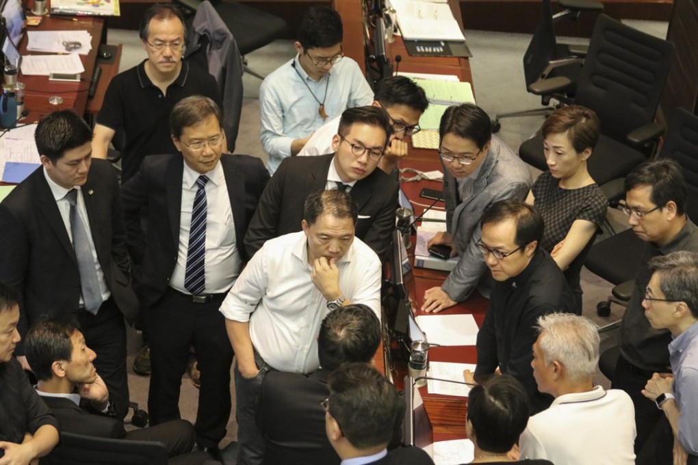 Pan-democratic lawmakers discuss tactics during a Legco meeting last month. Photo: Felix Wong