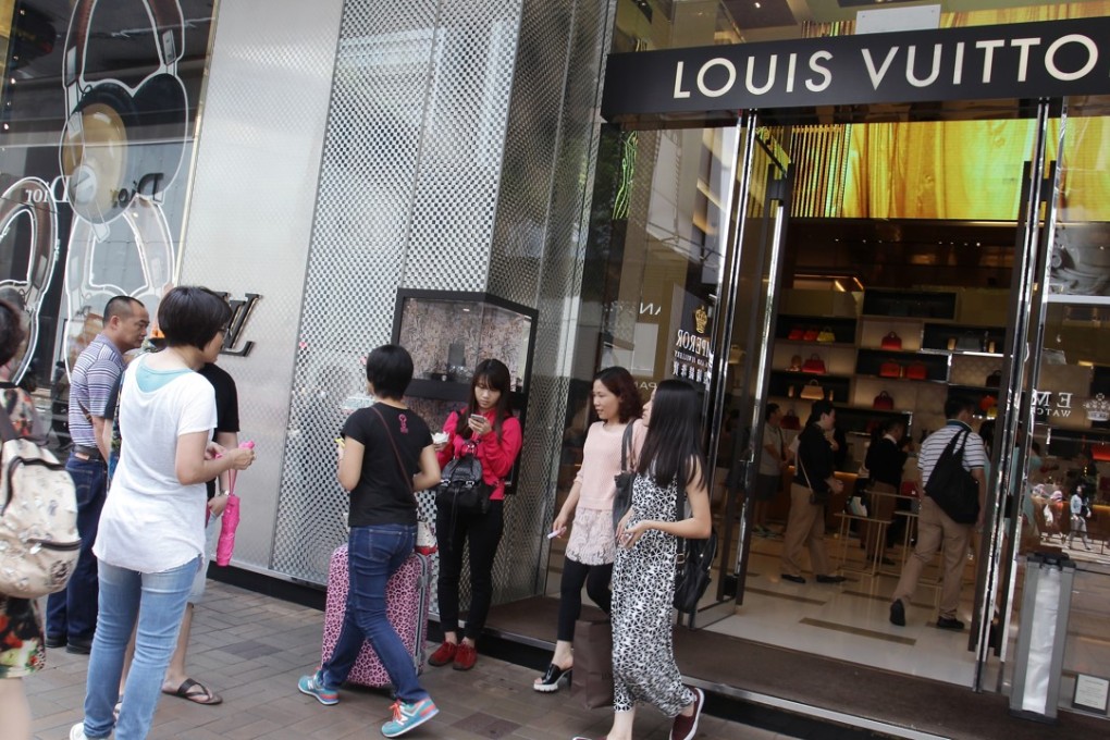 Shoppers at Louis Vuitton’s store in Canton Road, Hong Kong. Photo: Dickson Lee