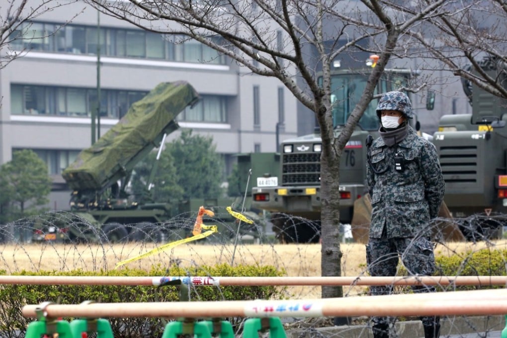 A member of Japan’s Self-Defence Force stands by a PAC-3 Patriot missile unit in Tokyo. Photo: AP