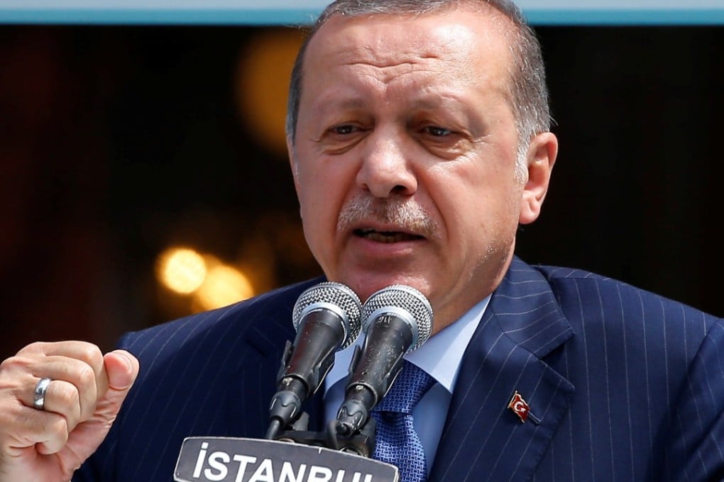 Turkish President Tayyip Erdogan delivers a speech during the re-opening of the Ottoman-era Yildiz Hamidiye mosque in Istanbul, Turkey. Erdogan renewed accusations against Germany of coddling terrorists. Photo: Reuters