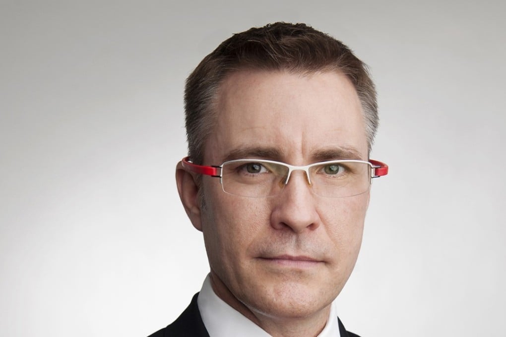 Denis Usher, managing partner